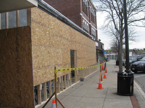 TEMPORARY PLYWOOD framing covers the front of the long vacant former site of the Ski & Sport Shack on Main Street as upgrades are underway. The neglected storefront has long been viewed as one of the more unattractive sites in the downtown. The owner of the property has obtained permits from the Building Department to update the storefront and the interior of the building. (Mark Sardella Photo)