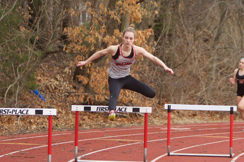 ABBY HARRINGTON, a senior captain, returns to run the 400 meter hurdles and compete in the jumping events this spring for the Warriors. (Donna Larsson Photo)