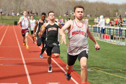 BRIAN SMITH, a sophomore, repeated as 400 meter champion at the MSTCA Freshman/Sophomore Meet which was held this past weekend at Norwell High School.