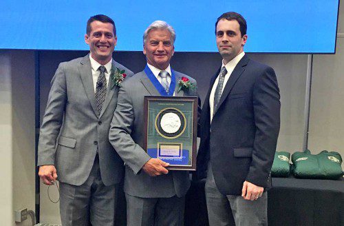 LYNNFIELD-NORTH READING co-op wrestling head coach Craig Stone (center) was welcomed into the Massachusetts Chapter of the National Wrestling Hall of Fame by President Sean Harrington (left) and Black and Gold Assistant Coach Nick Secatore. (Courtesy Photo)