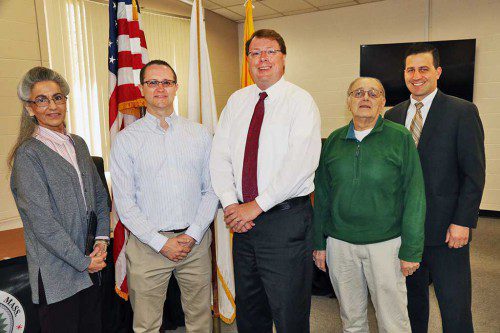 The town's newest elected officials, School Committee member Scott Buckley and Selectman Andrew Schultz, were sworn into office on Wednesday morning following Tuesday's town election. From left to right are: Town Clerk Barbara Stats, Buckley, Schultz, Board of Selectmen Chair Bob Mauceri, and Town Administrator Mike Gilleberto. (Al Pereira/Advanced Photo)