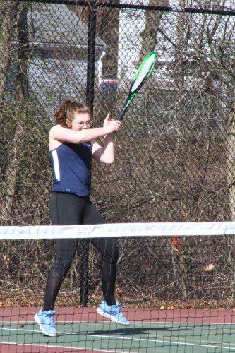 HORNET opponents were swatted by Katie Nevils last week. Against North Reading, she prevailed 6-4, 6-1 at second singles. Versus Manchester-Essex, she won 6-1, 6-4 playing third singles. (Maureen Doherty Photo)