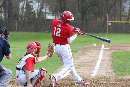 THE MELROSE Red Raider baseball team fell just short to Wilmington on Tuesday, 5-3. Pictured batting is senior Nick Cordeau. (Donna Larsson photo) 