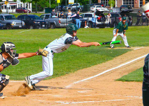 Senior Mike McCauley attempts to lay down a bunt during Saturday’s playoff game against Saugus. (John Friberg photo)