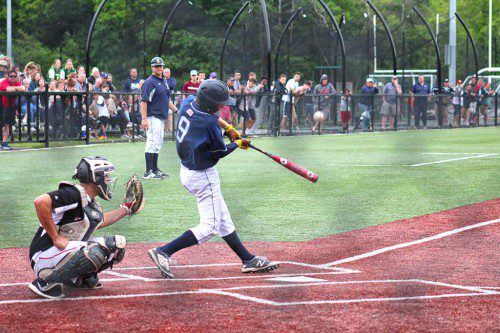 SOPHOMORE Jonathan Luders (9) connects on a two-RBI double in the fifth inning during the third seeded Pioneers’ 8-0 victory over Saugus in the first round of the Division 3 North state tournament June 4. (Dan Pawlowski Photo)