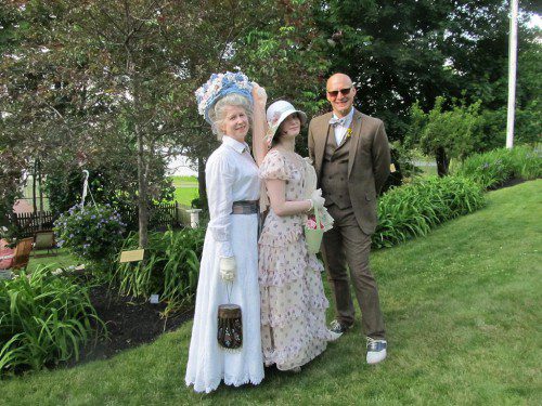 THE MILLER FAMILY of Wakefield dressed in formal Victorian attire, including fancy hats, for the Hartshorne House’s Victorian party. From left: Carlana Miller, Ruby Grace Miller and Tom Miller.  (Gail Lowe Photo)