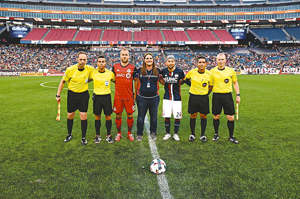 LIZ DESELM of Melrose was recognized by the New England Revolution as the Honorary Captain alongside Toronto FC midfielder Benoit Cheyrou and Revs midfielder Lee Nguyen at Gillette Stadium during Pride Night on Saturday, June 3.