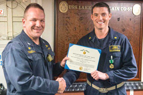 Lt. Commander Chris Peters, a North Reading native, is shown here receiving the Navy’s Commendation Medal. (Courtesy Photo)