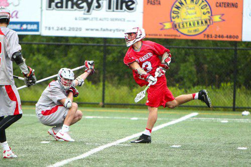 MIKE PEDRINI'S five goals weren't enough for the Melrose High boy's lacrosse team, who fell to undefeated Wakefield in semifinals, 12-11 on Tuesday. (Donna Larsson photo) 