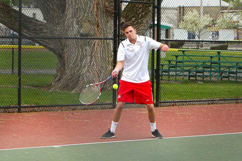 THE MELROSE High boys’ tennis team wrapped up the season with a winning 13-5 record. Pictured is senior captain Jack Mays in first singles. (Donna Larsson photo)