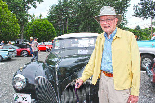 PLANNING BOARD member Charlie Wills proudly displays his 1941 Lincoln Continental at the      Senior Center’s Antique Car Show June 27. (Dan Tomasello Photo)