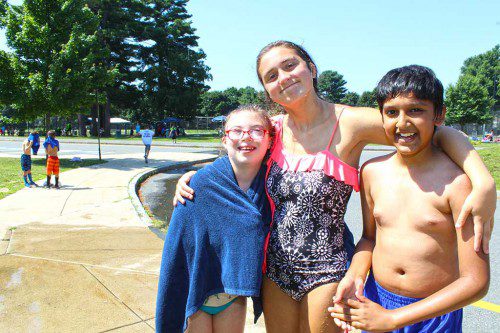 A DAY of fun on the waterslide at Rec Station was shared by friends, from left, Ella Doherty, Rachel Perrin and Sahil Patel on Friday. (Maureen Doherty Photo)