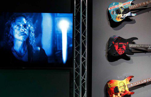 METALLICA GUITARIST Kirk Hammett appears in a recorded video beside some of his guitars at the Peabody Essex Museum in Salem. (AP Photo/Michael Dwyer)