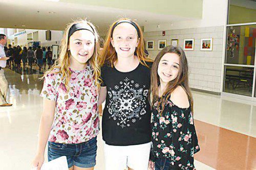 A TRIO of friends, from left, Taylor Accolla, Rachel Rech and Samantha Tauro enjoyed exploring the Middle School last Thursday during the informal “Walkabout” held to allow the school’s newest students become familiar with their new surroundings. (Maureen Doherty Photo)