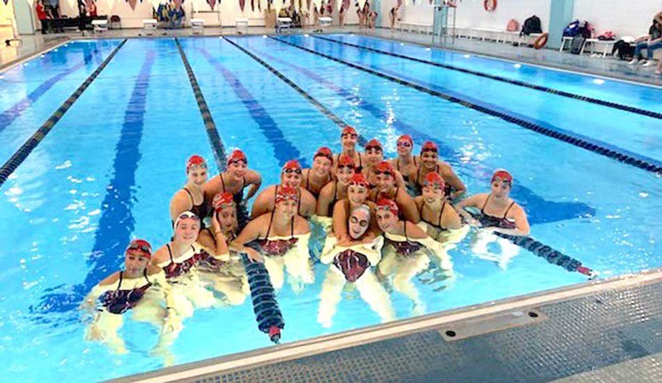 Warrior swimmers make waves  at league championship meet