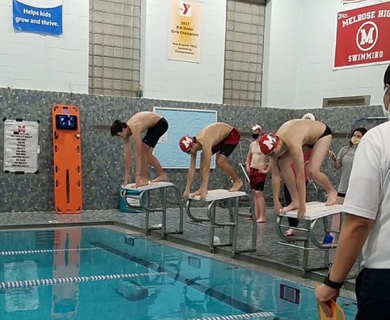 Boys’ swim starts season off with a win