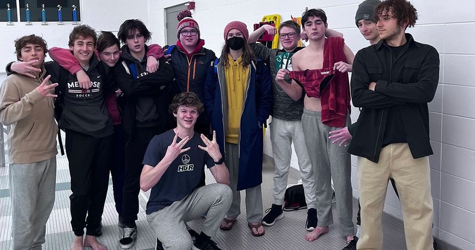 Boys swim dives into season with a win