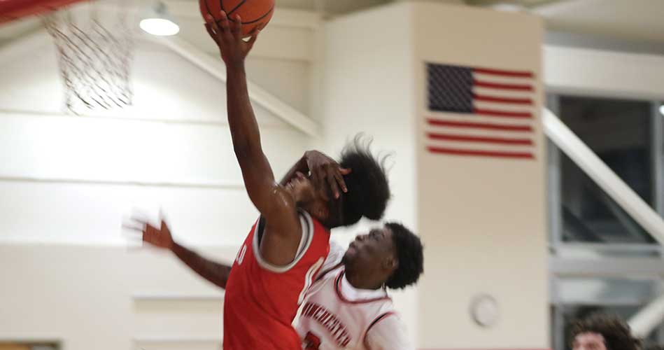 Boys hoop earns hard-fought victory on the road against Winchester