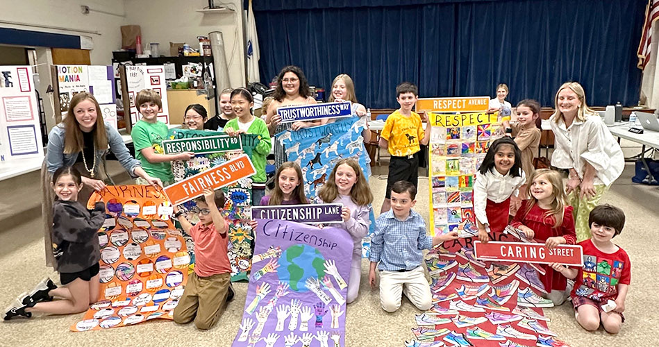 Little School students showcase character-building project to School Committee