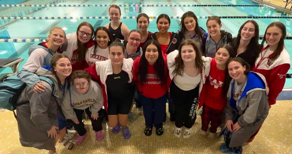 Warrior swimmers impress at League Meet, get ready for Sectionals this weekend