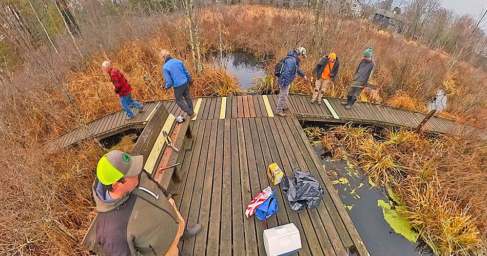 Volunteers repair Partridge Island boardwalk